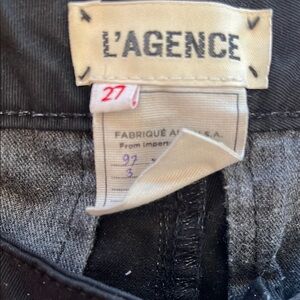 L’Agence black cargo jeans with zip ankles. 97/3% cotton/spandex